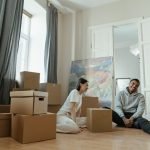 A couple talking about how to prepare your home for a move