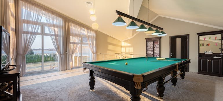 A pool table in the room
