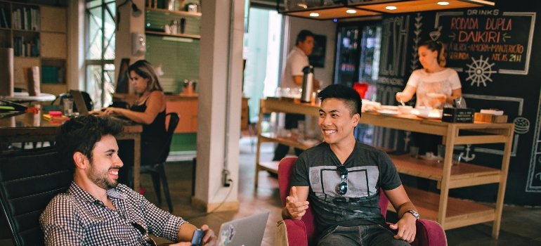 two guys in a bar discussing the job market and employment opportunities in San Antonio