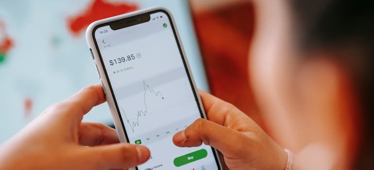 A person looking at the statistics of the Schertz real estate market