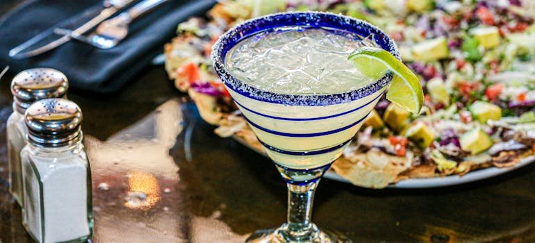 A food plate and a glass on the table