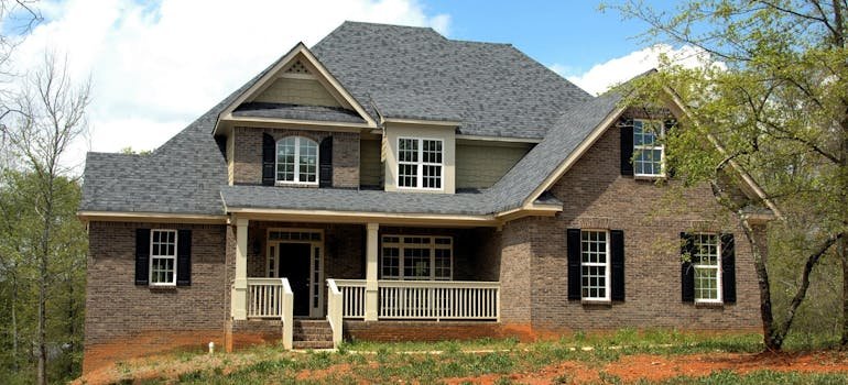 A brown house with the garden