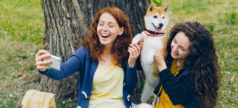 Two women with the dog in one of the most affordable cities in Bexar County