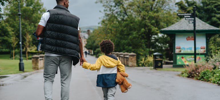Kid and a frather on the street