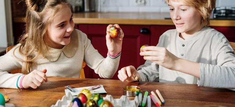 Kids decorating eggs