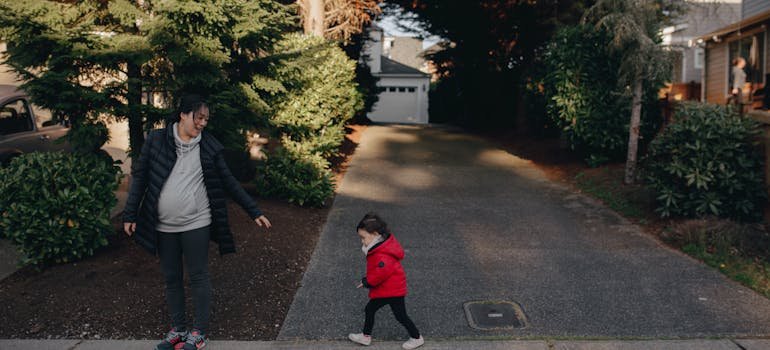 A mother and a kid on the street