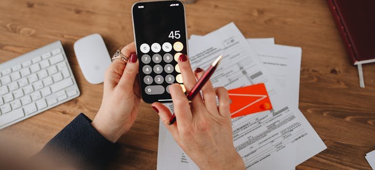 A person using calculator 