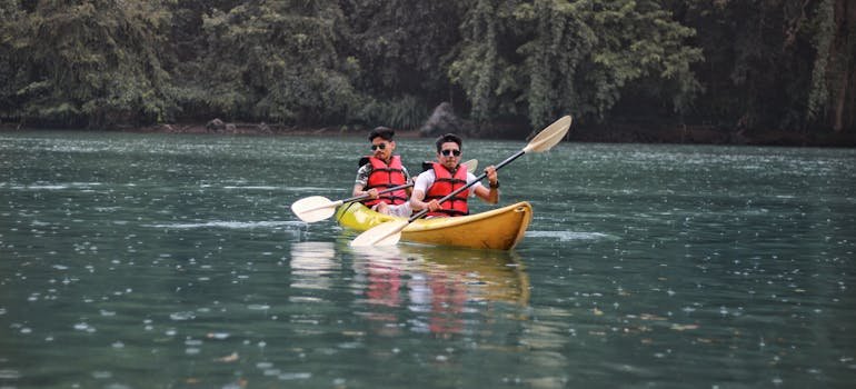 Two people kayaking and enjoying one of the outdoor adventures near San Antonio