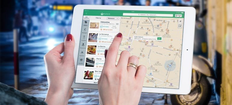 A person using Ipad to find your dream home in Cibolo