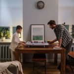 Father and a son playing a game