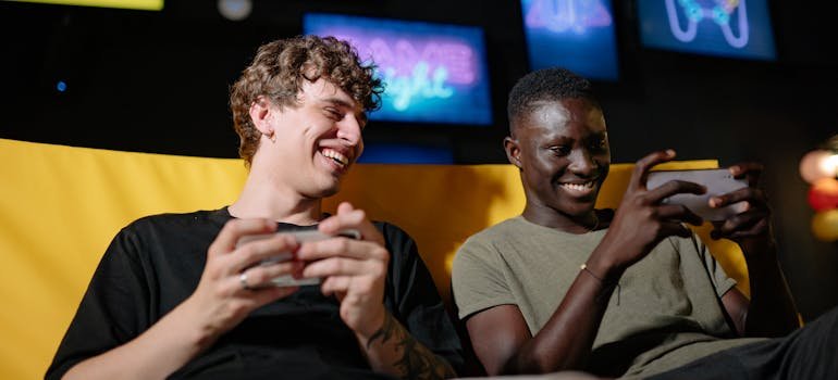 Two friends in the game room