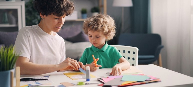 Mother and Son Playing at Table