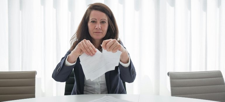 Businesswoman Tearing Up Documents