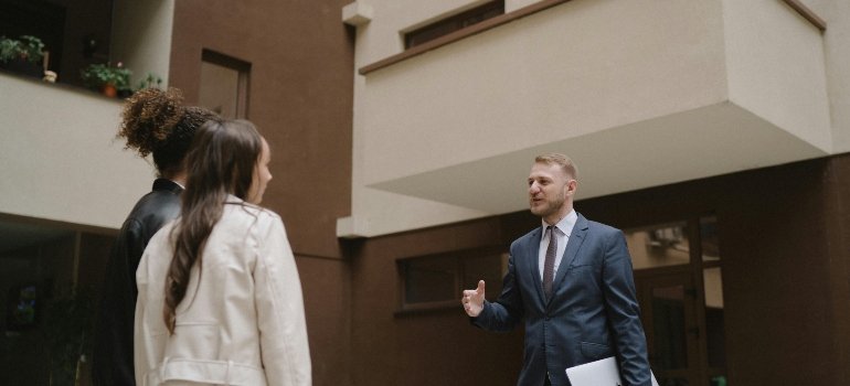 a man and a woman talking about moving from Seguin to Boerne