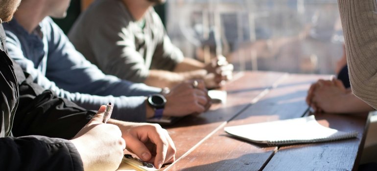 People during a meeting disccusing the commercial movers San Antonio offers