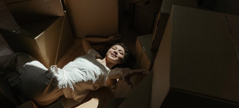 Woman who is happy because she managed to hire Hill Country movers