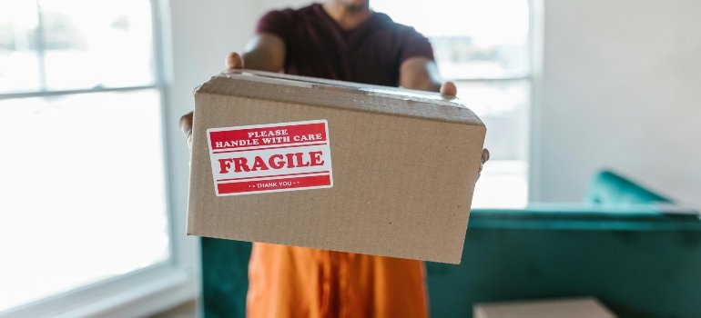 A man holding a box.