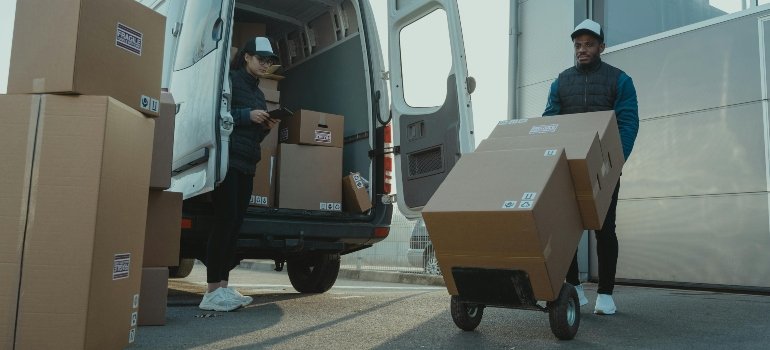 Movers loading boxes efficiently.