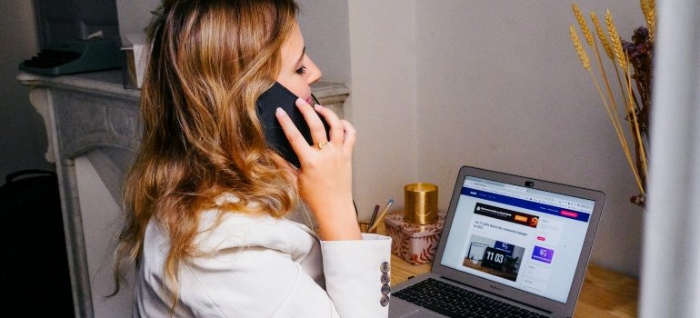 Person contacting one of the best moving companies Boerne TX offers