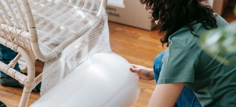 a girl stretching the chair
