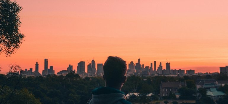 a boy thinking about office move to Universal City