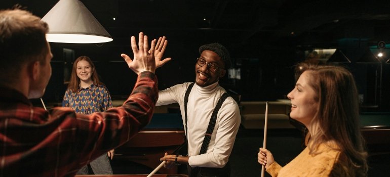 playing billiard on the pool table