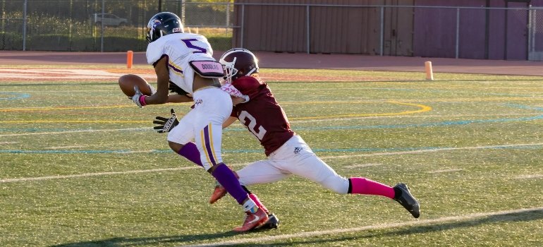 Youth football game highlighting how timing your move from Cibolo to New Braunfels can affect family routines.