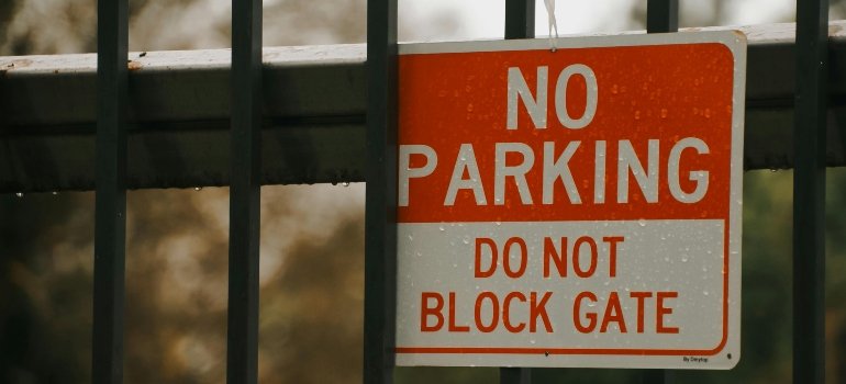 No parking sign reminding homeowners to plan access before a residential move.