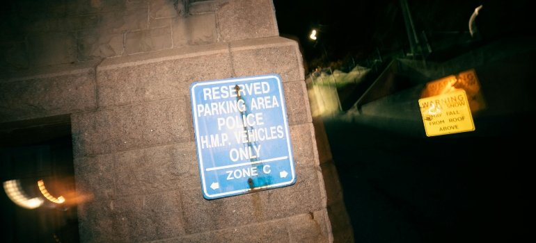 Reserved parking sign highlighting access and permit considerations during a residential move.