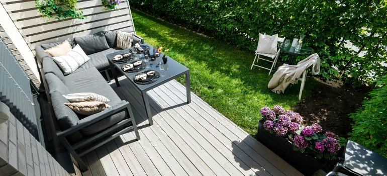 Staged furniture illustrating steps to prepare patio furniture for a move safely.