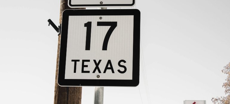 Texas highway sign reflecting relocation routes many families review on their moving to-do list.